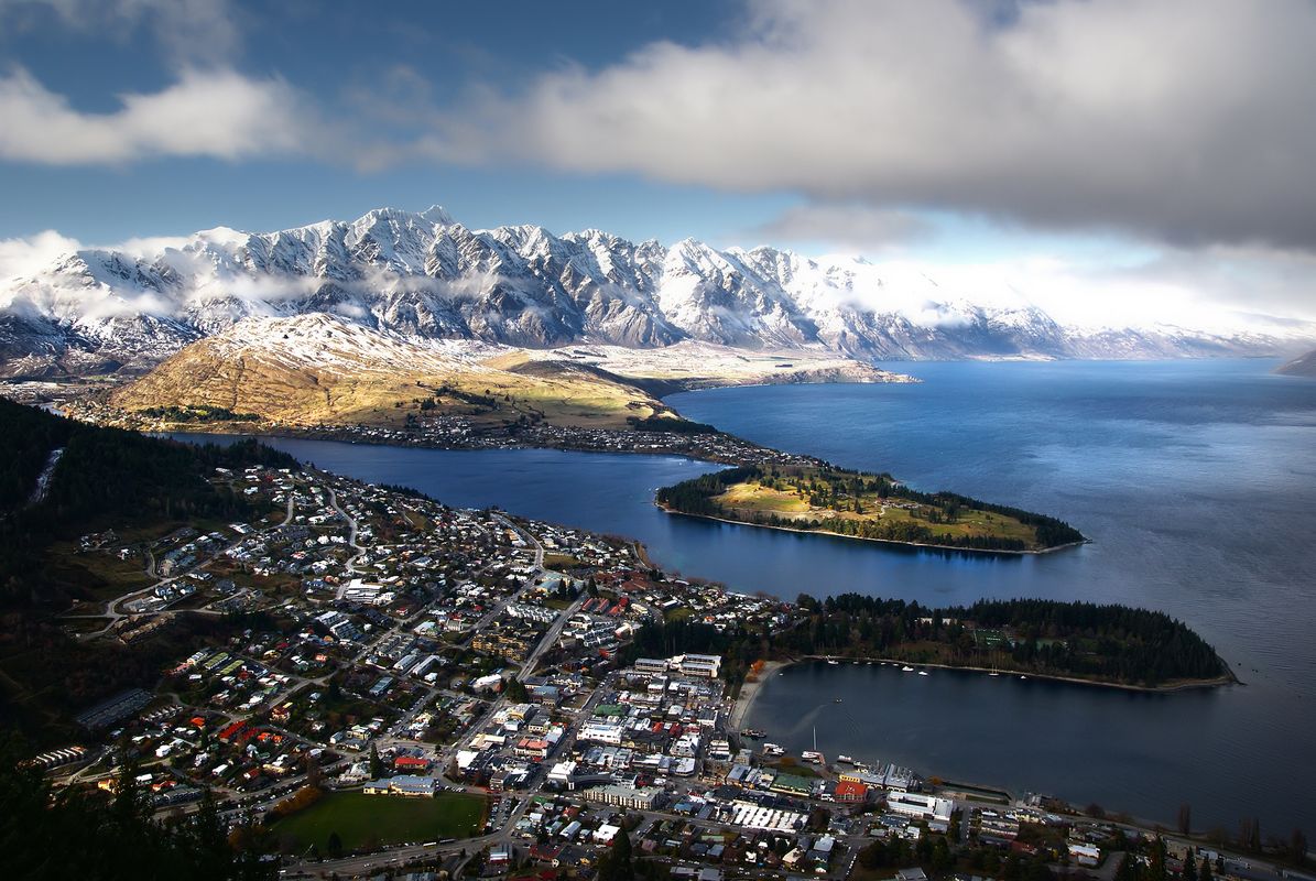 Queenstown lakefront with The Remarkables mountain range reflected in Lake Wakatipu